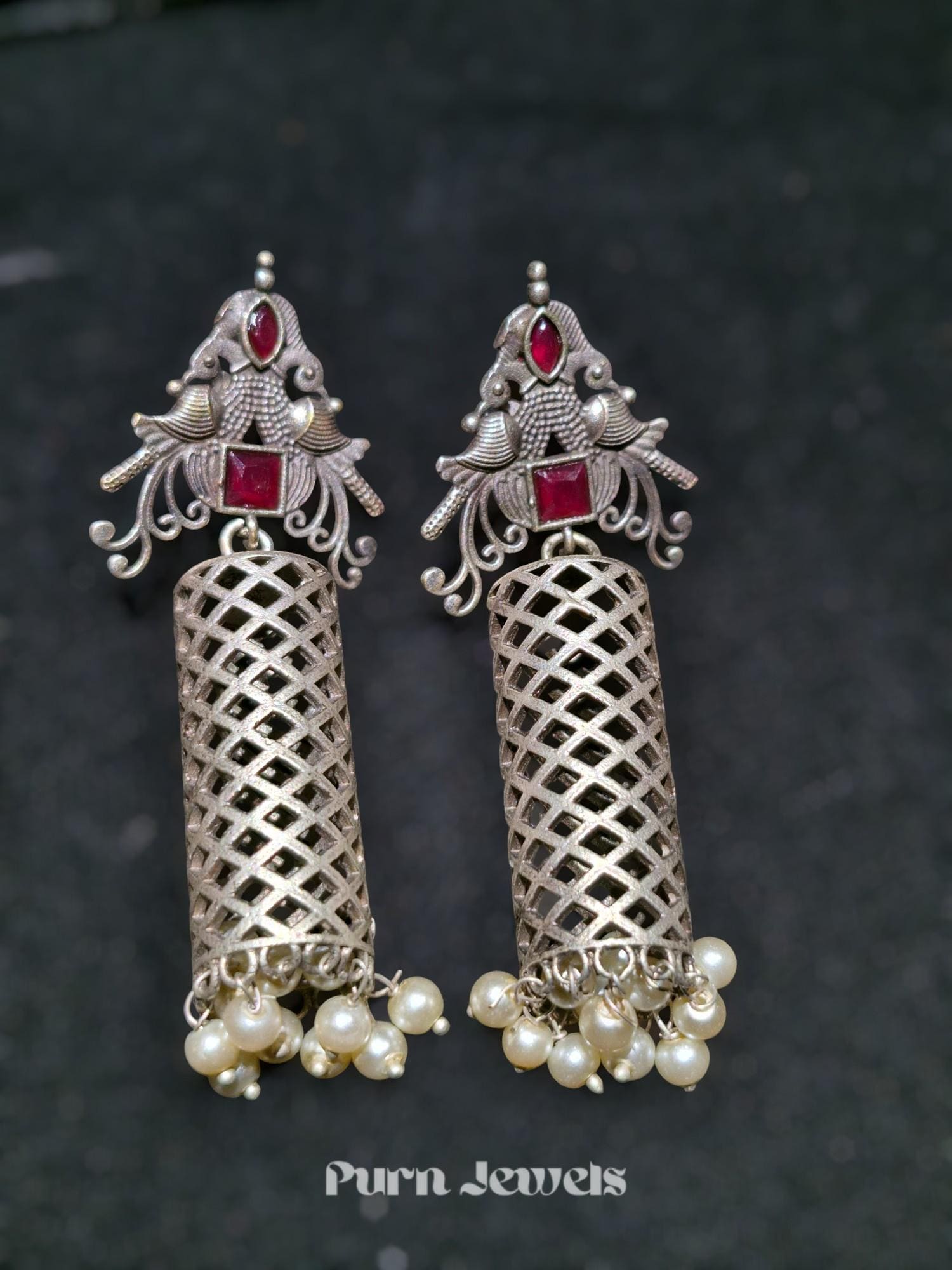 Varya oxidised cylindrical earrings design