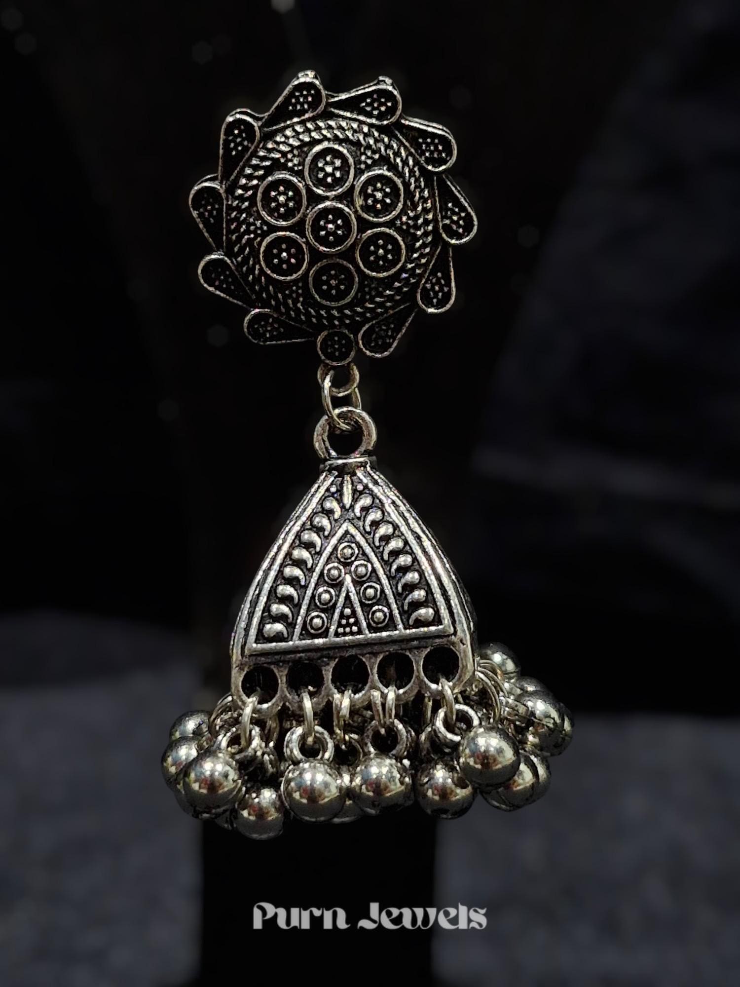 Nitara oxidised jumka earrings